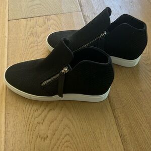 Steve Madden slip on booties with zippers.